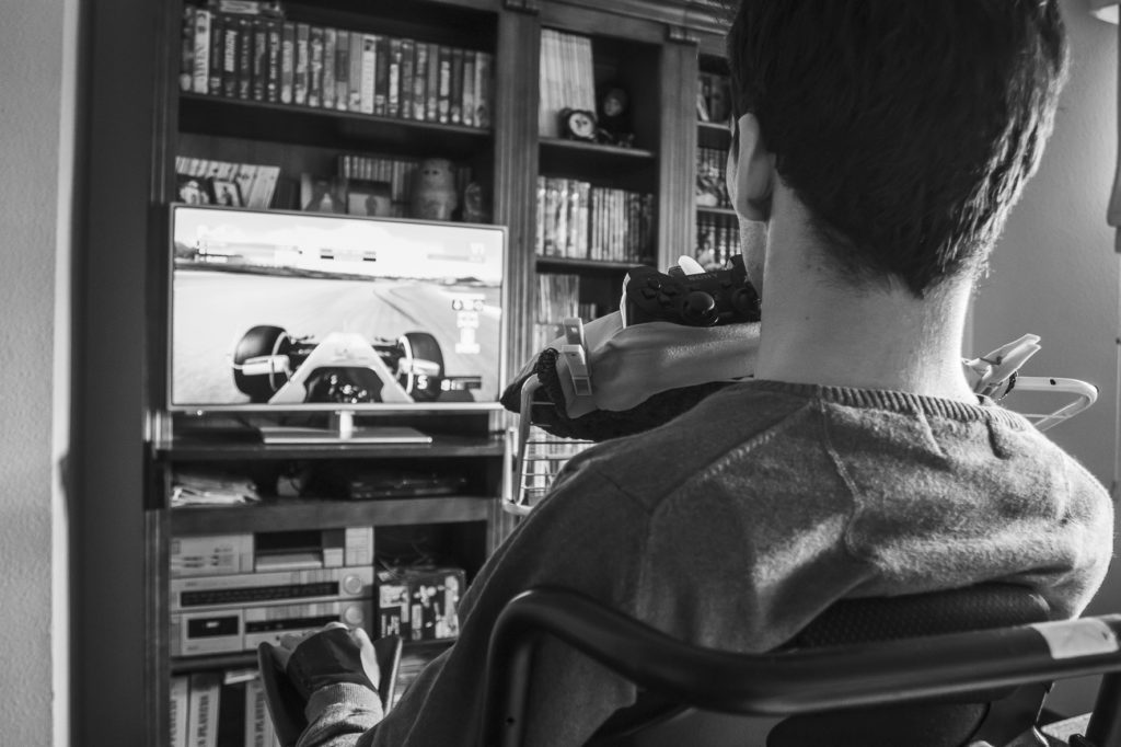 Man playing videogames, picture taken by Alvaro Blanco Palanques